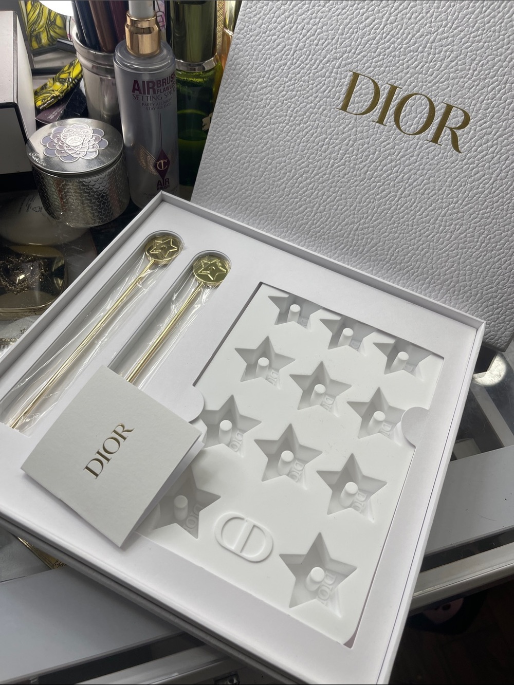 Dior beverage set with silicone star mould and two golden tone stir Rods